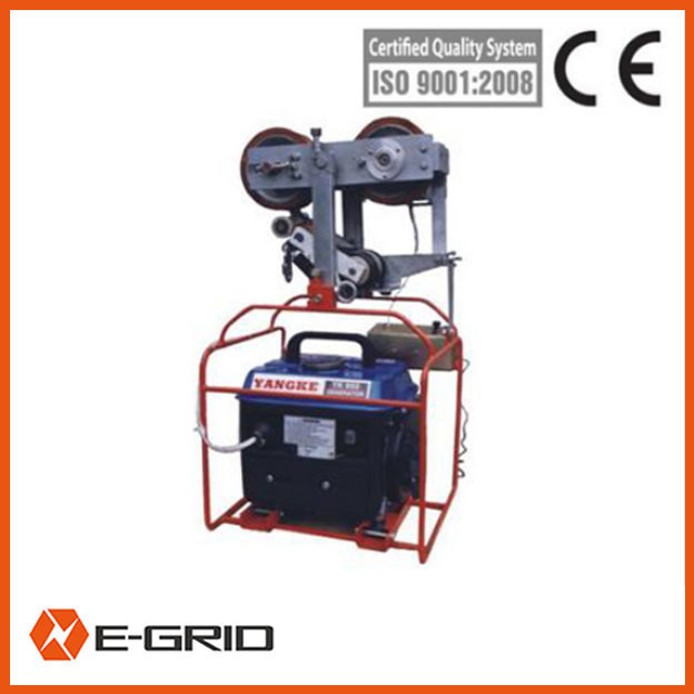 Self running traction machine for overhead conductor replacing and OPGW stringing